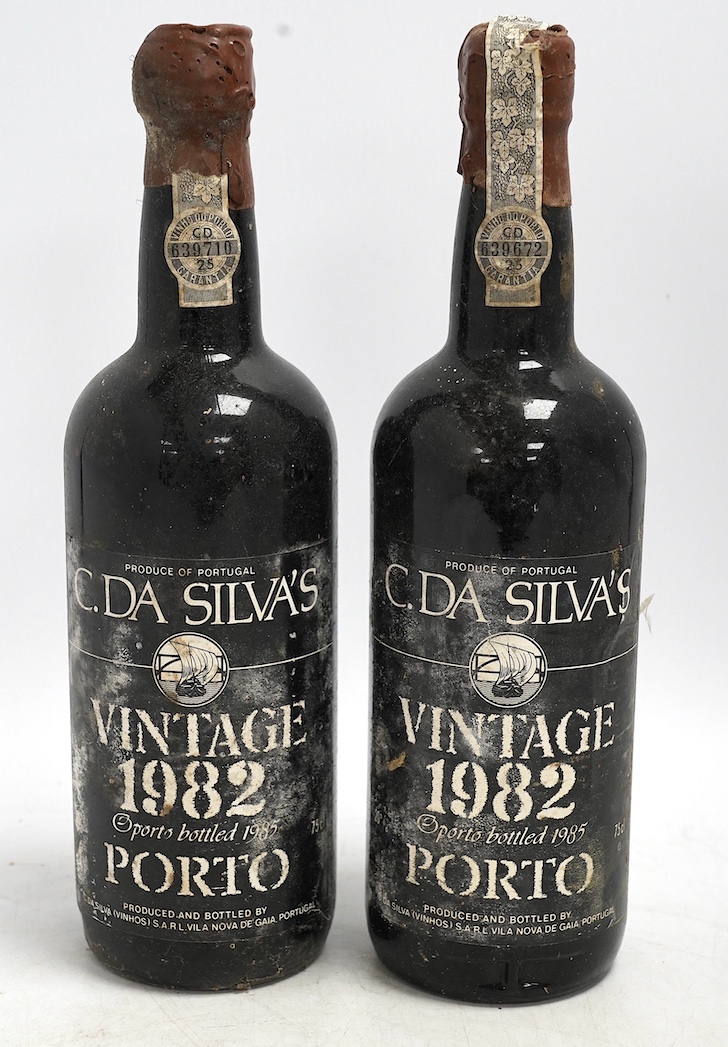 Six bottles of port to include three bottles of C. Da Silvas vintage 1982 Porto and three other bottles with deteriorated labels. Condition - bottles dirty, storage history unknown